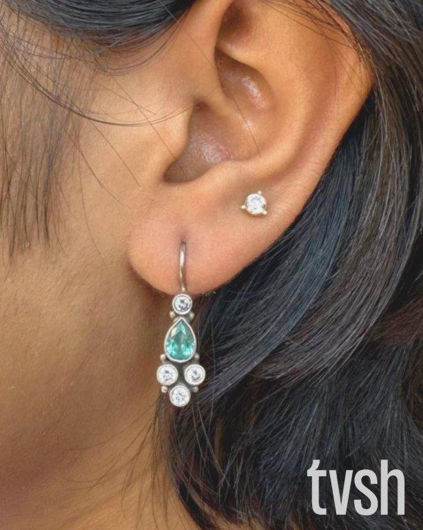 Silver hook and lock with blue semiprecious stone and zirconia