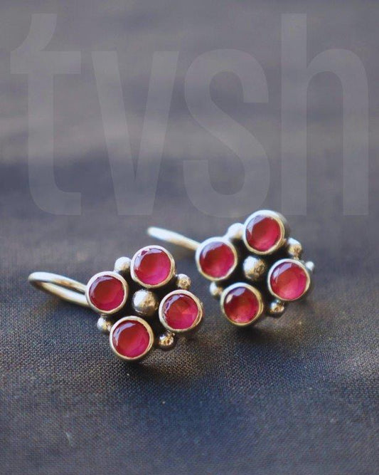 Silver hook and lock with red semiprecious stones