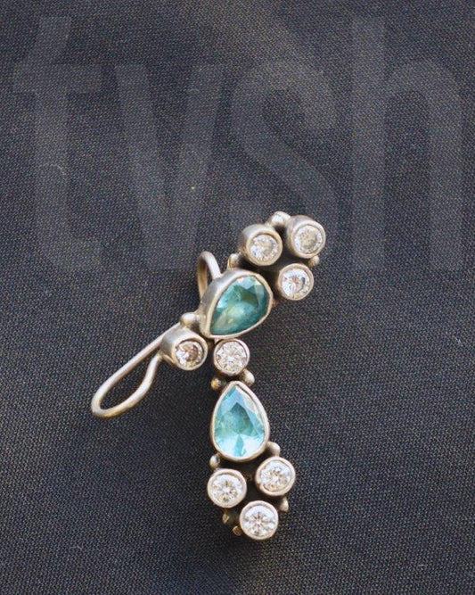 Silver hook and lock with blue semiprecious stone and zirconia