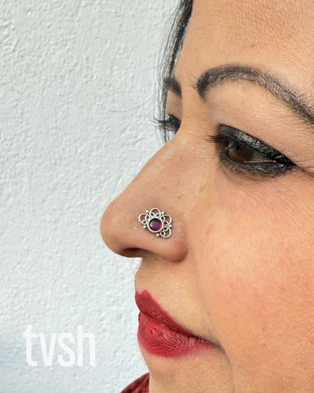 Silver wired nose pin with a semiprecious red stone